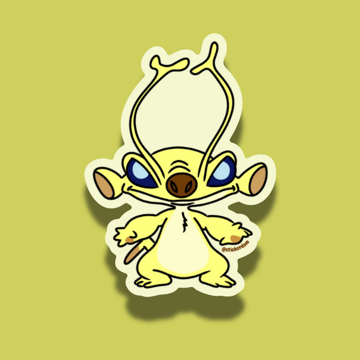 Cartoon character with large ears and blue eyes on a green background