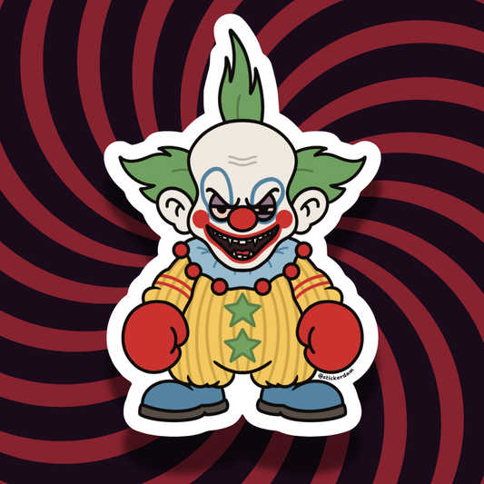 Shorty from Killer Klowns from Outer Space with green hair, a yellow clown suit, and red boxing gloves, illustrated as a die-cut sticker.